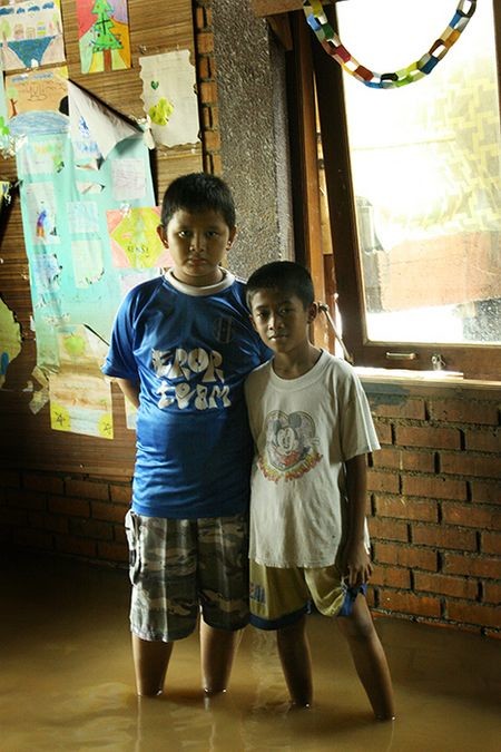 Two boys in a flooded Bukit Duri classroom during the rainy season. The young are more vulnerable to waterborne diseases ciliwung14.jpg