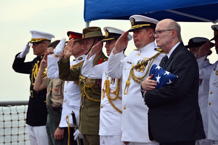 Paying tribute: Representatives from Indonesia, Australia and the United States of America paid tribute to the crew of the HMAS Perth and the USS Houston at a ceremony in March 2015 - Source: US Navy
