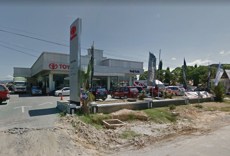 A photo of the front of a Toyota dealership.