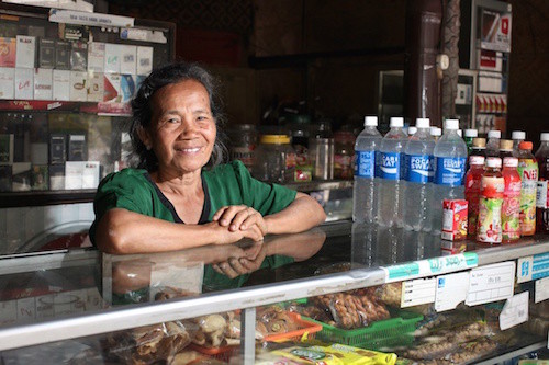 Christina in her small kiosk - Anne-Cecile Esteve for Asia Justice and Rights (AJAR) in her small kiosk- Anne-Cecile Esteve for Asia Justice and Rights (AJAR) Christina in her small kiosk - Anne-Cecile Esteve for Asia Justice and Rights (AJAR)