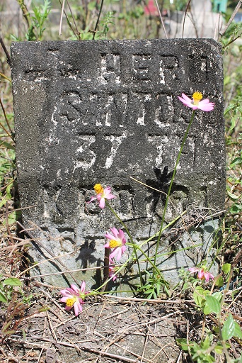 A simple headstone marks the grave of Heru Susanto, a political prisoner. He was 37 when he died, only months before he was due to be released